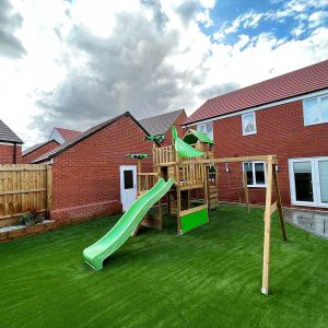 Children's' slide on new artificial lawn