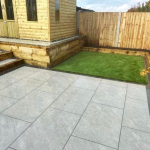 Artificial grass lawn and garden shed